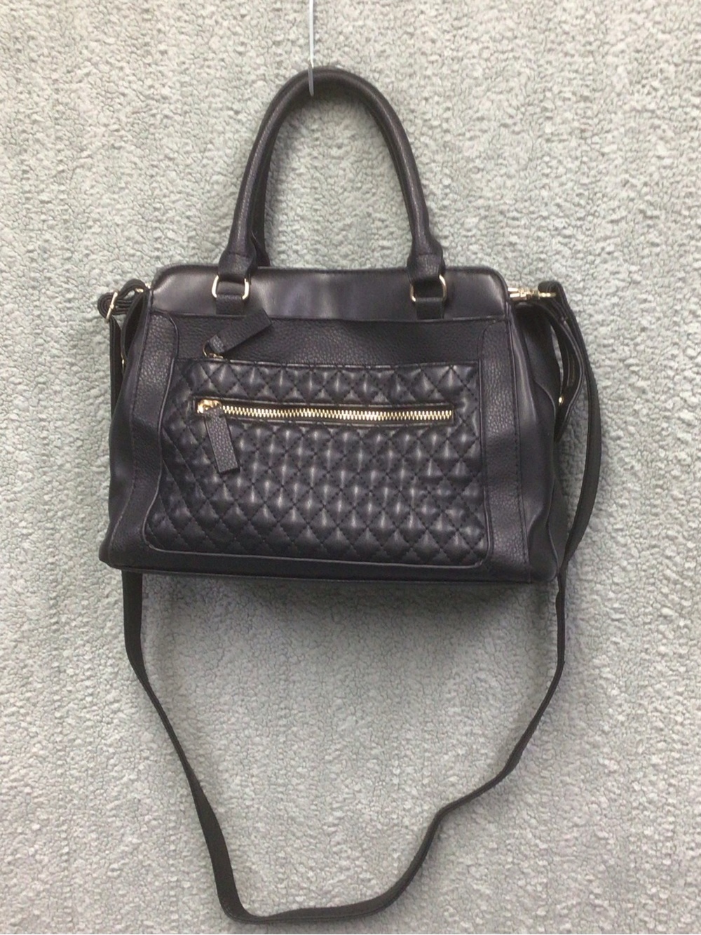 Elegant Vintage Black Leather Satchel Purse with a quilted pattern on front.